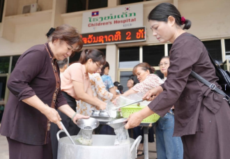 OVs in Laos provide heartfelt meals for the needy 